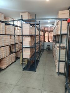 Heavy duty racks and slotted angle racks in Gurgaon, shoe boxes kept on it for easy inventory access and management.