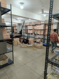 Heavy duty racks and slotted angle racks in Gurgaon, shoe boxes kept on it for easy inventory access and management.