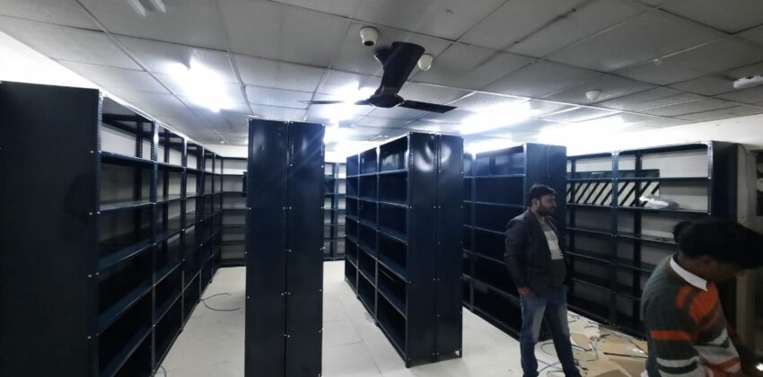 Slotted angle racks for shop in dark grey color used in a supermarket to keep daily house hold items in the slotted angle racks