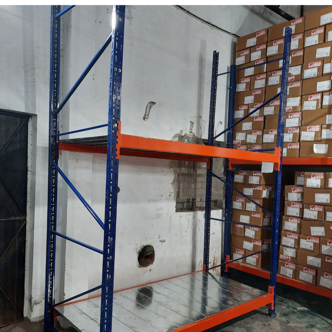 Warehouse Racks in Noida which are blue and orange in colour and have nothing on it with base level